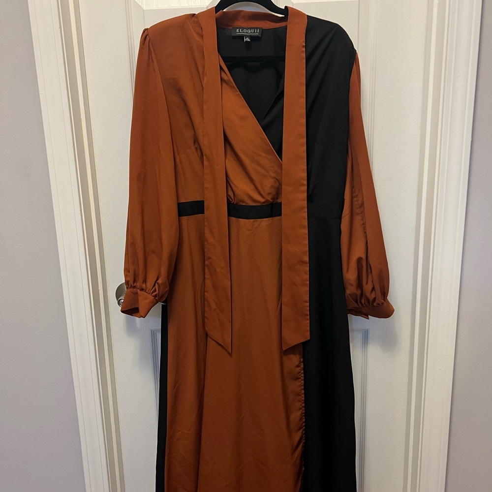 Burnt orange and black faux wrap dress